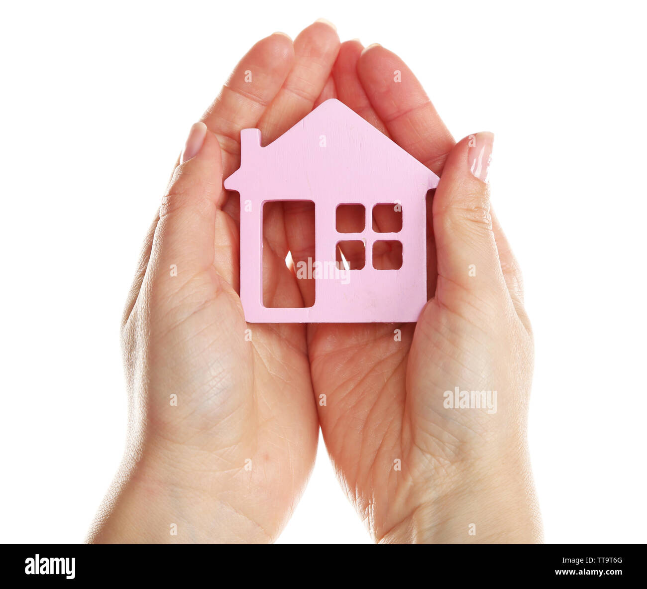 Female hands holding model of house isolated on white Stock Photo - Alamy