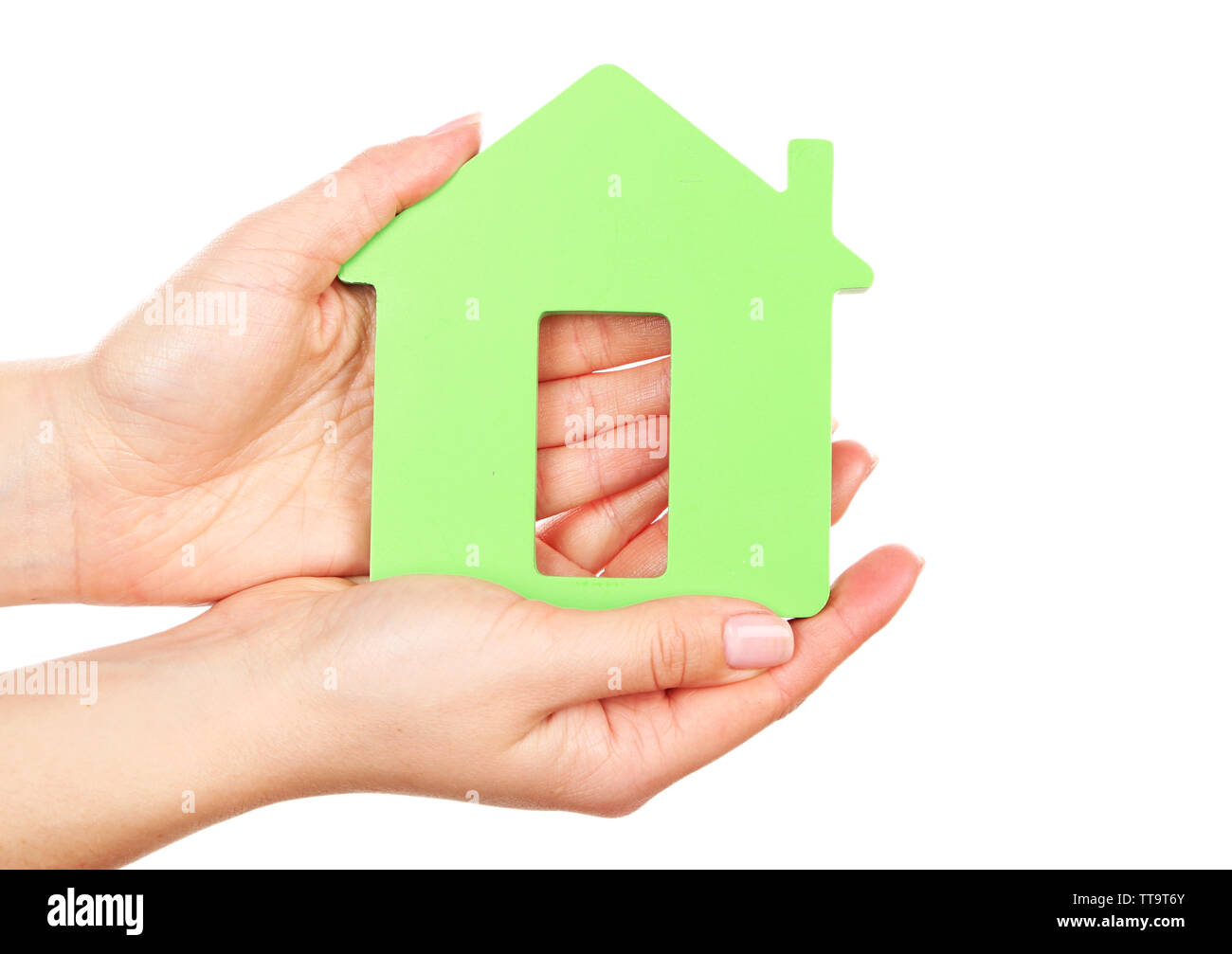 Female hands holding model of house isolated on white Stock Photo - Alamy