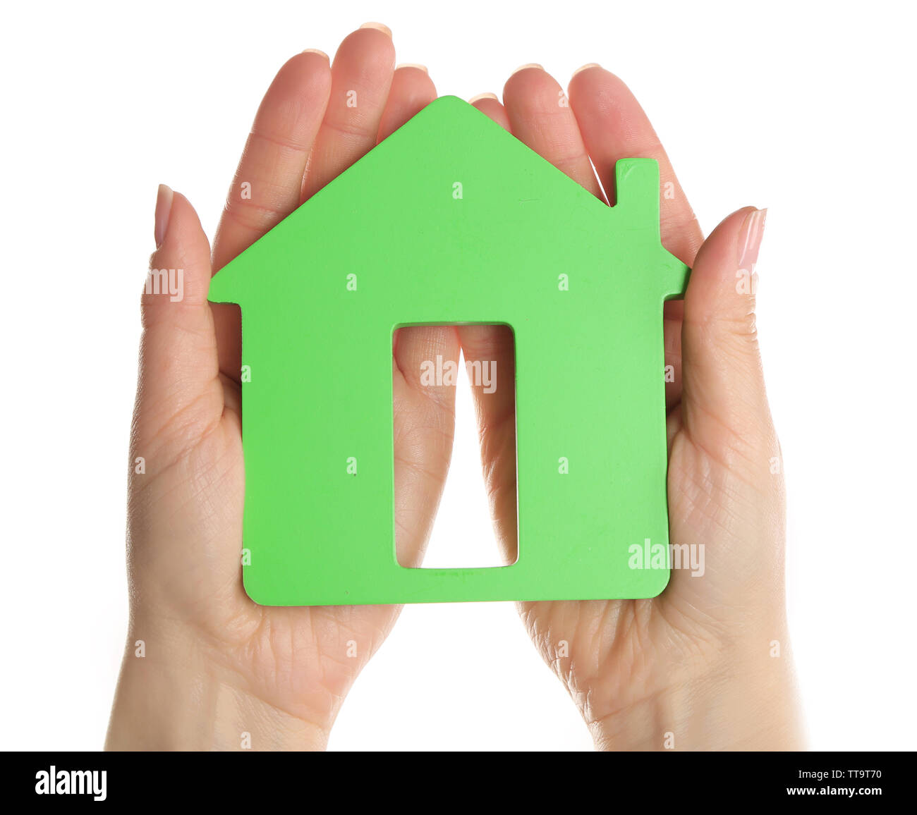 Female hands holding model of house isolated on white Stock Photo - Alamy