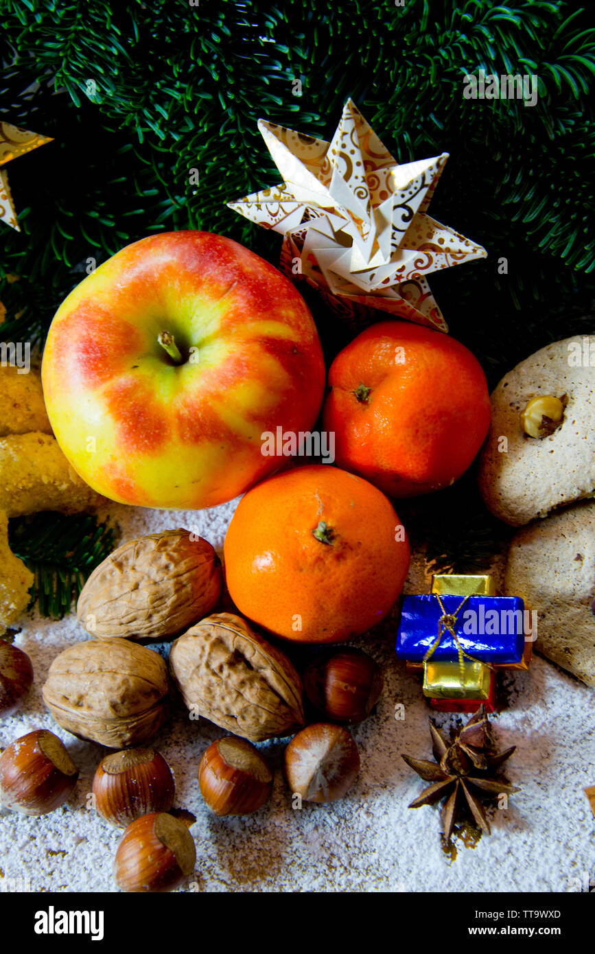 traditional german christmas sweets plate with fruits, nuts aqnd