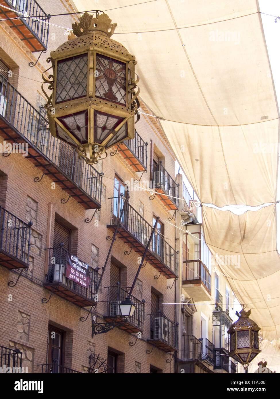 Building facades & ornate street lamps in Toledo, Spain Stock Photo Alamy