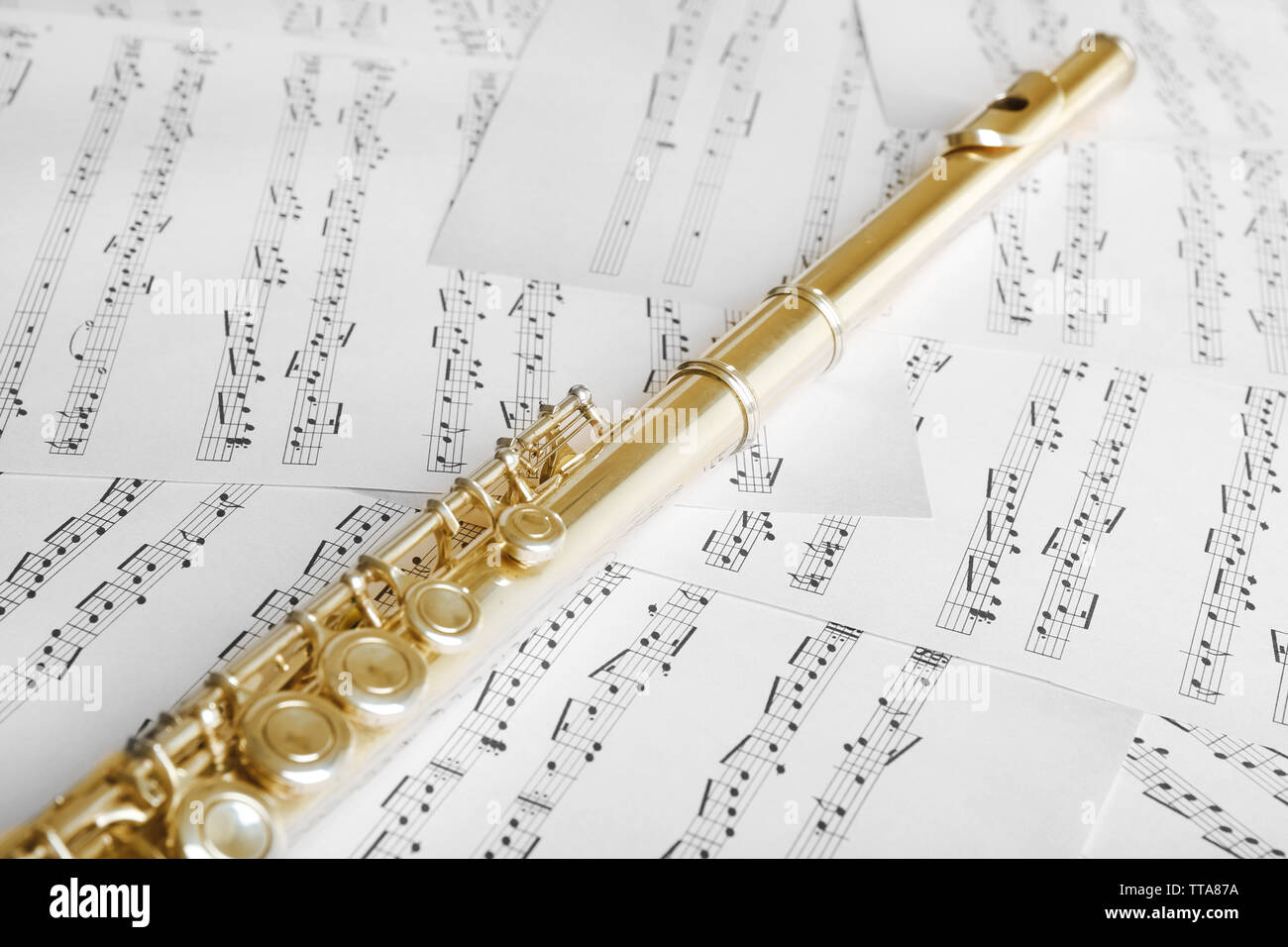 Flute on music notes background Stock Photo Alamy