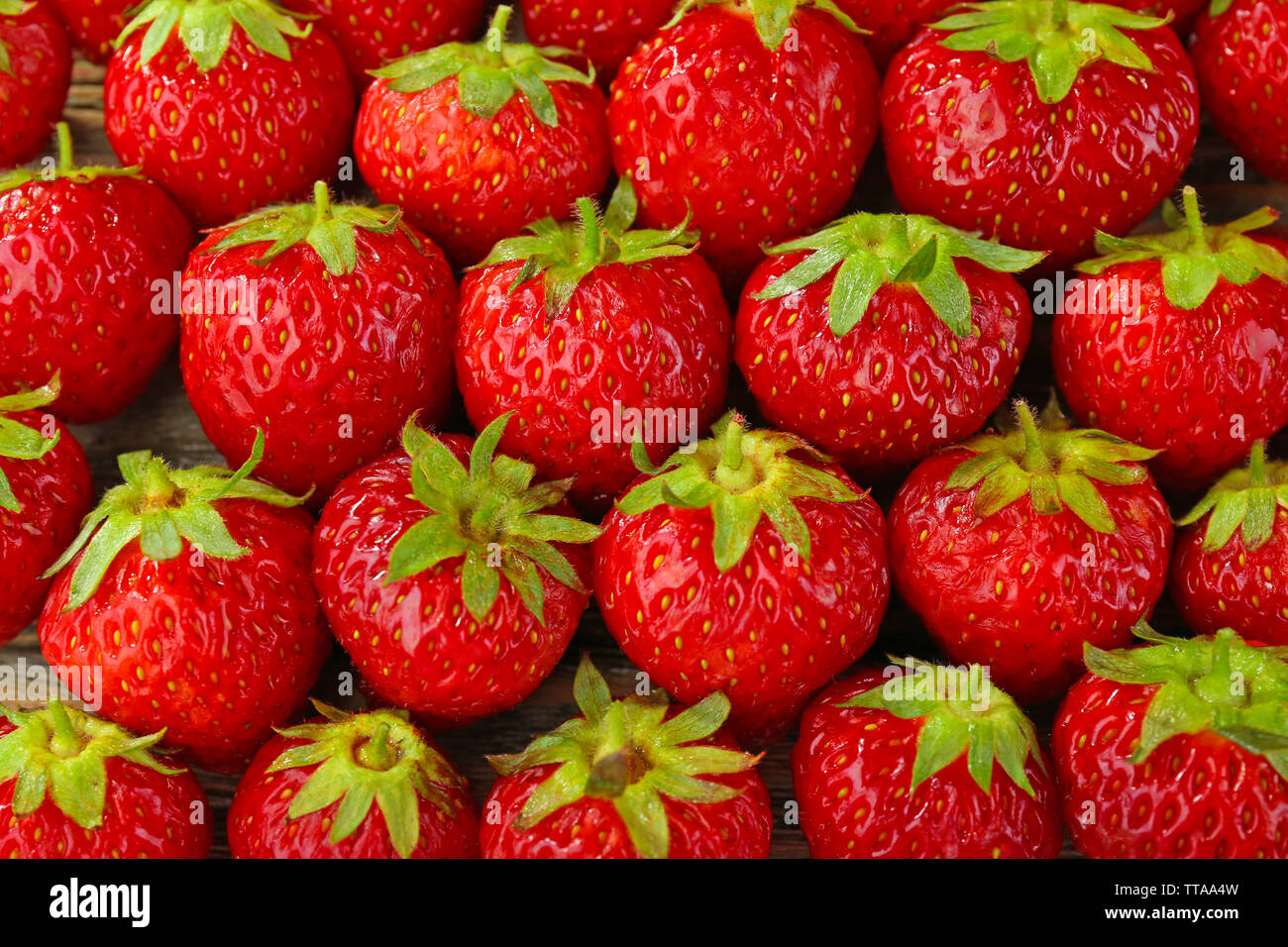 Ripe strawberries background Stock Photo - Alamy