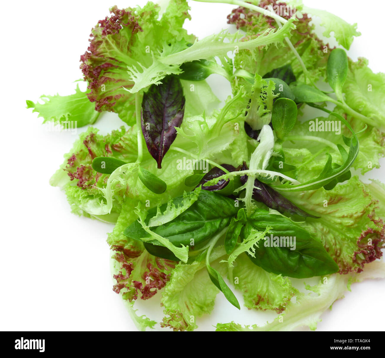 Fresh mixed green salad isolated on white Stock Photo Alamy