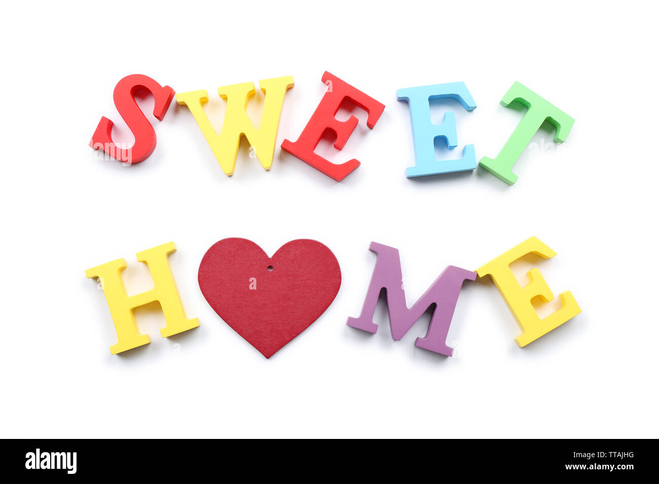 Decorative letters forming words SWEET HOME with heart isolated on