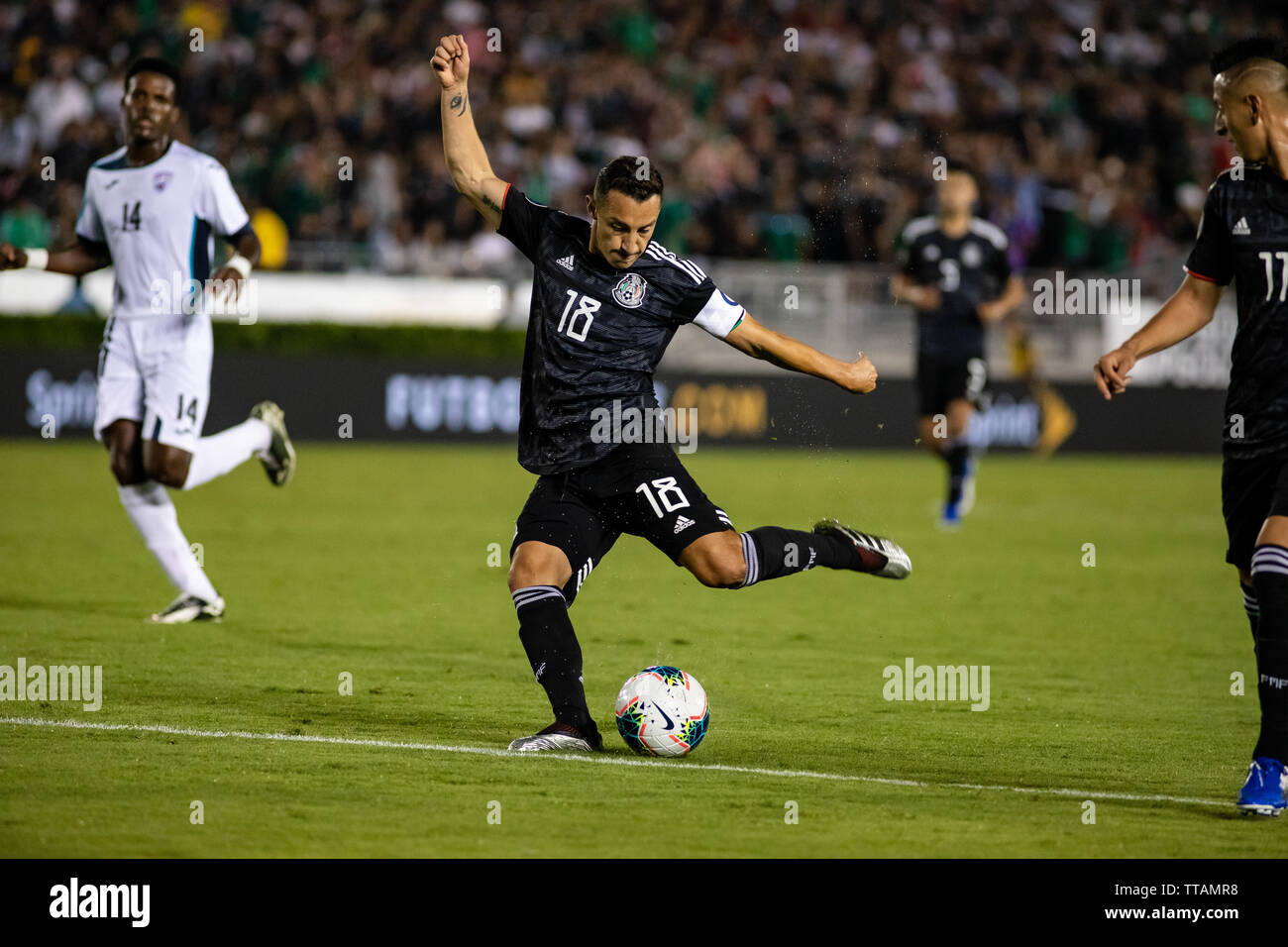 Pasadena, USA. 15th June, 2019. Andres Guardado (18) rips a shot from the 18 yard line in the second half of Mexico's Gold Cup opener against Cuba. Credit: Ben Nichols/Alamy Live News Stock Photo