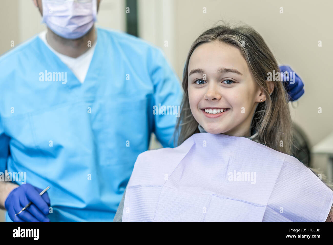 Dental clinic. Reception, examination of the patient. Teeth care. Young woman undergoes a dental