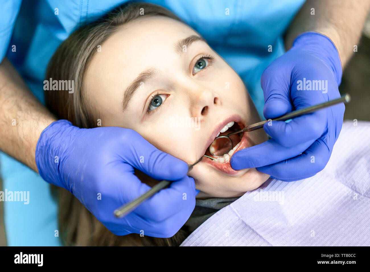 Dental clinic. Reception, examination of the patient. Teeth care. Young