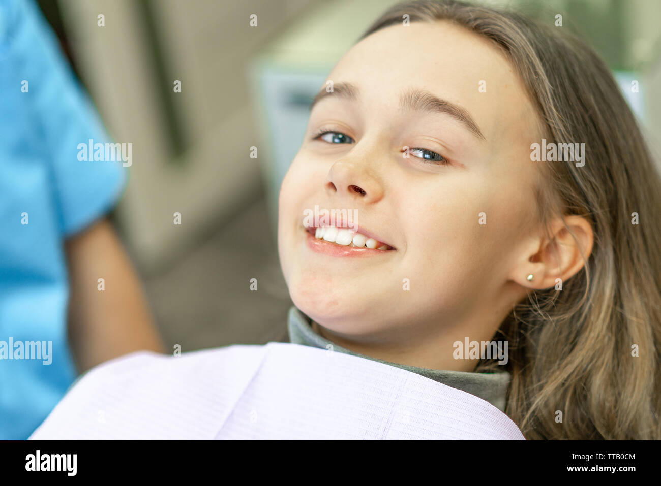 Dental clinic. Reception, examination of the patient. Teeth care. Young woman undergoes a dental
