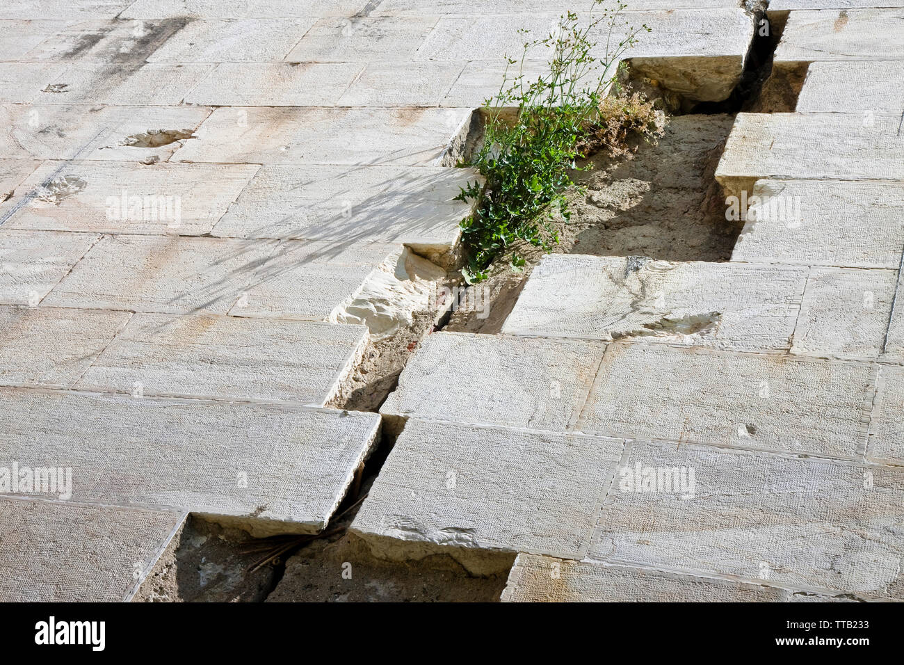 Stone slab detached due to infiltration of water Stock Photo