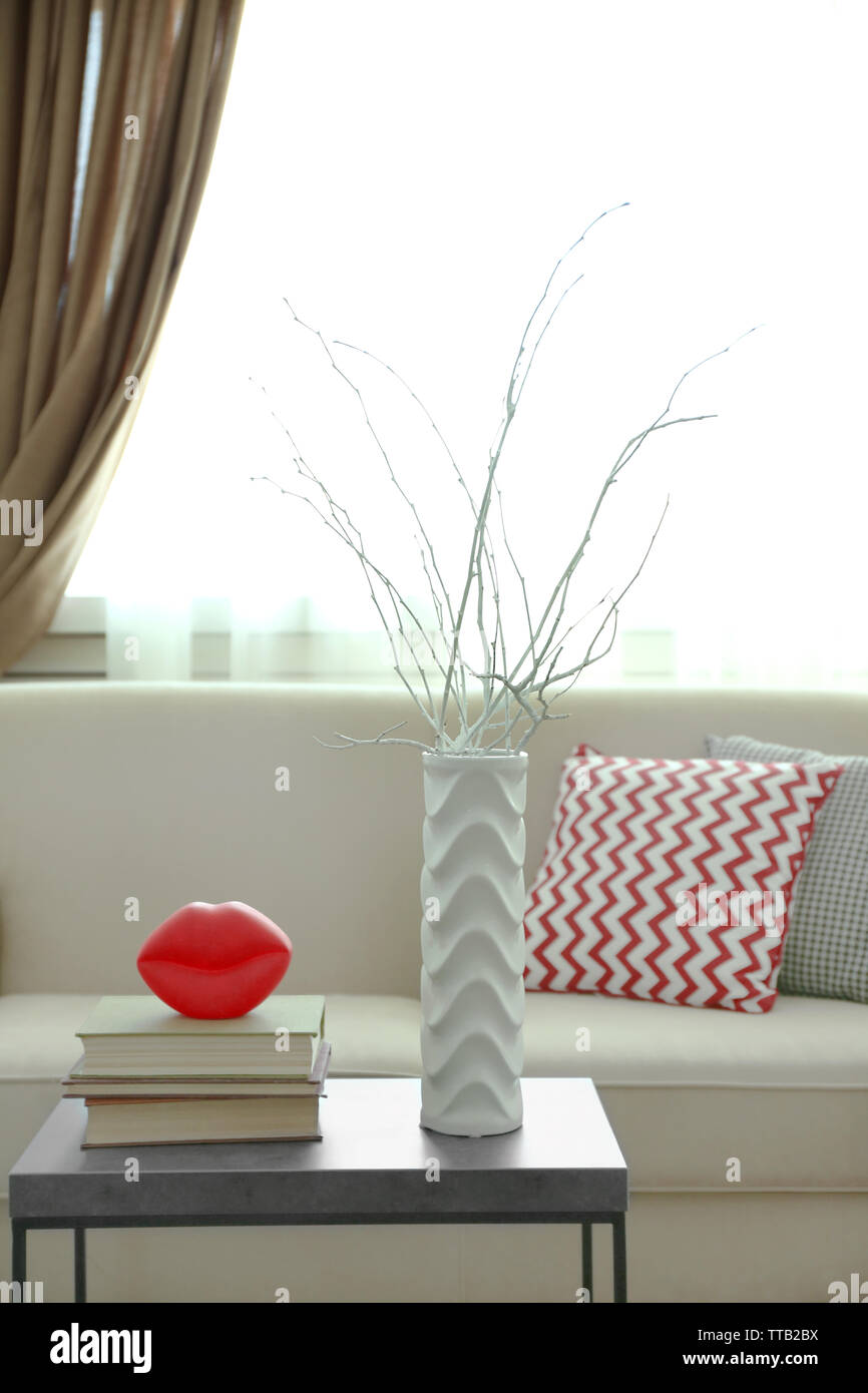 Interior of modern living room with sofa and table Stock Photo - Alamy