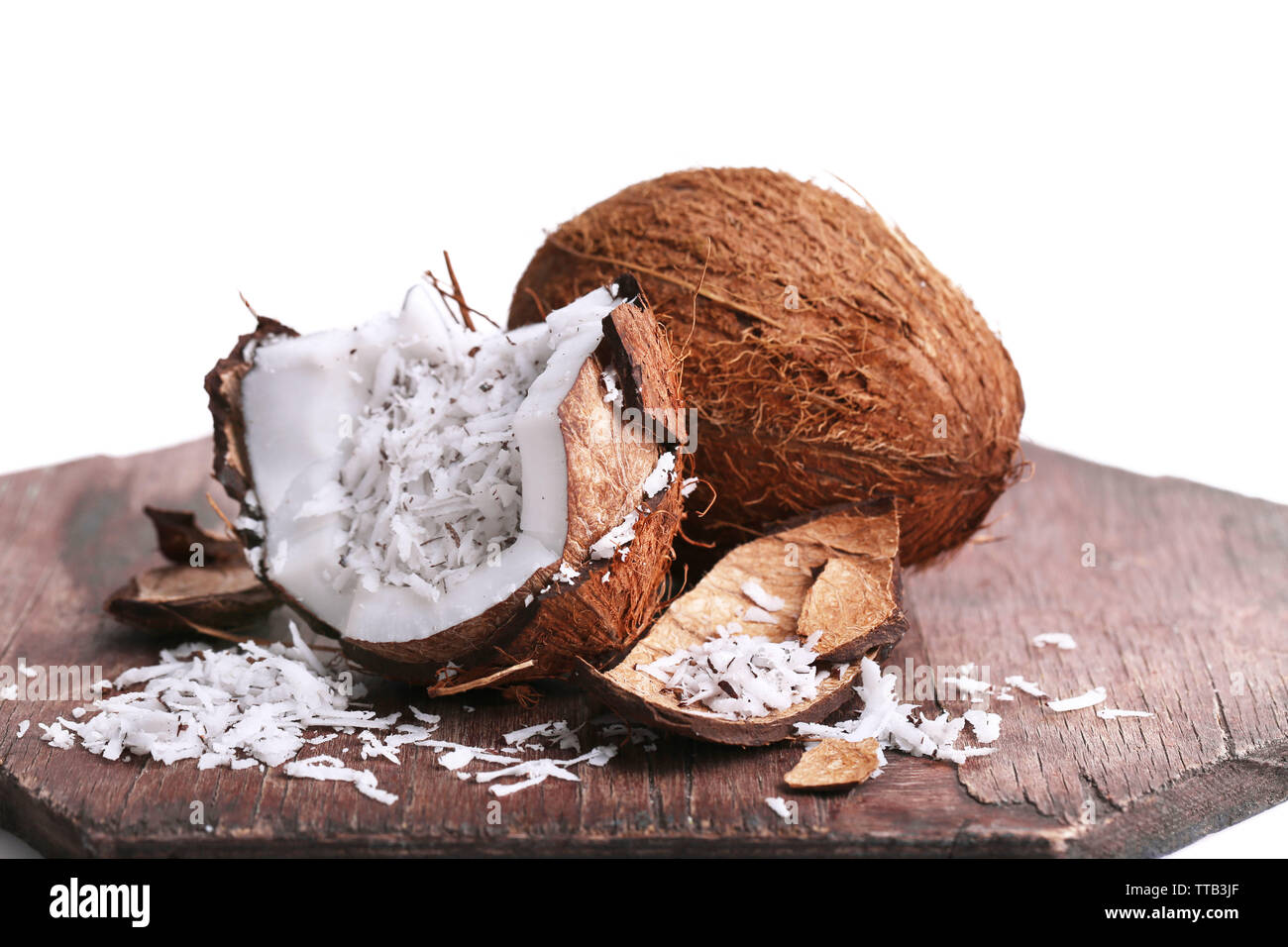 Coconut shavings in coconut isolated white Stock Photo Alamy