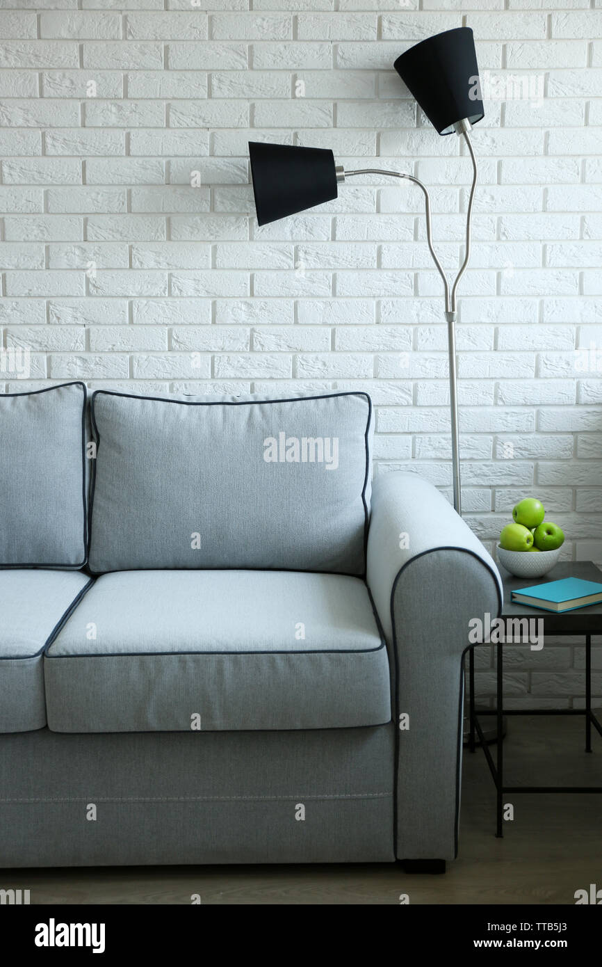Beautiful modern living room with grey sofa and floor lamp Stock Photo ...