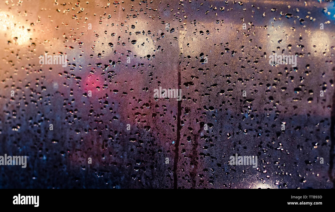 Abstract traffic in raining day. View from car seat. Rainy days, Rain