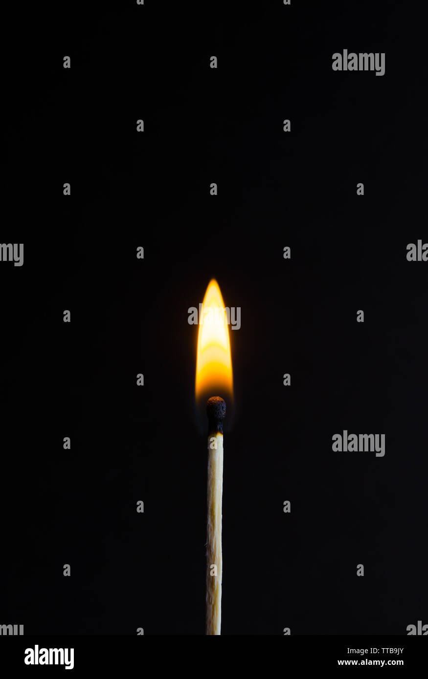Photo of a burning match on a black background with fire Stock Photo ...