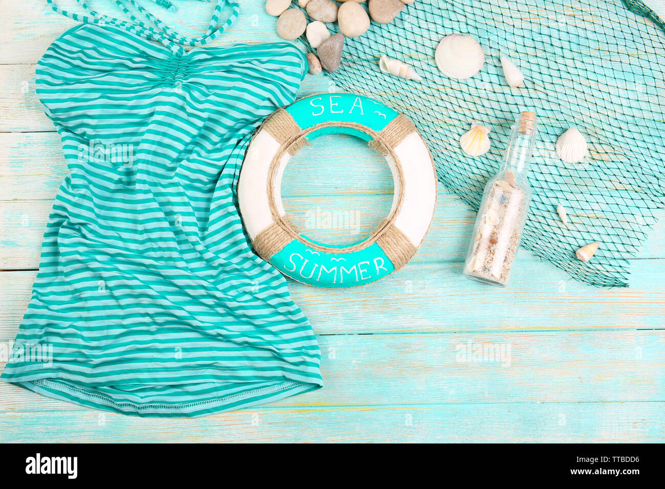 Summer accessories on wooden background Stock Photo
