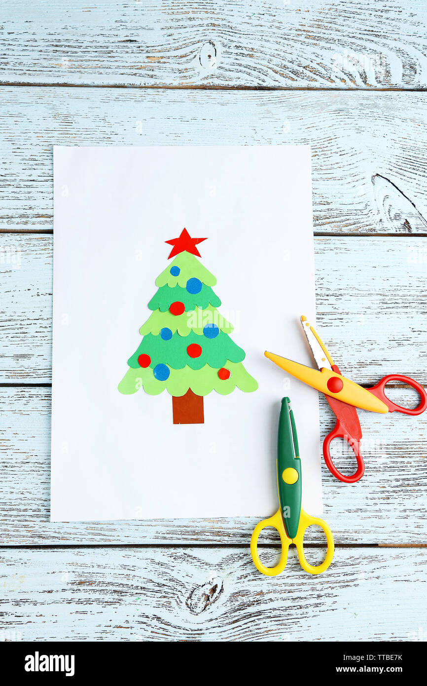 Creative Paper Christmas Tree On White Paper Sheet Scissors And