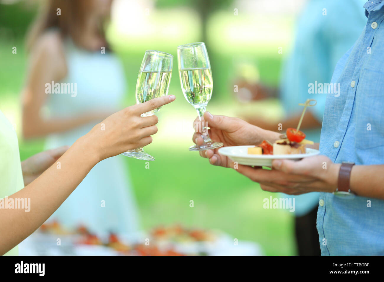 Guests drink champagne on wedding ceremony Stock Photo Alamy