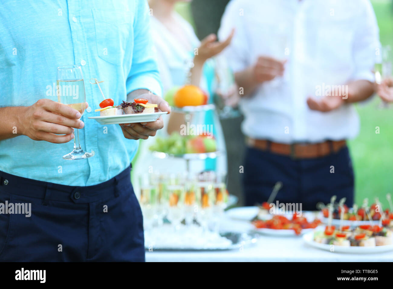 Guests drink champagne on wedding ceremony Stock Photo Alamy