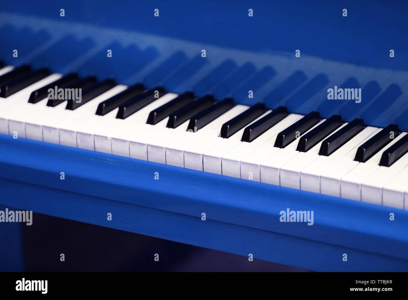 Piano keys of blue piano close up Stock Photo