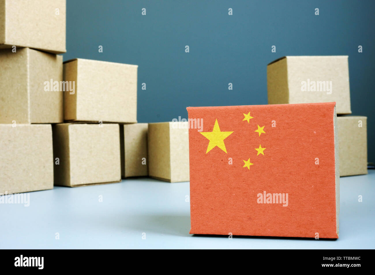 Made in China. Cardboard box with chinese flag. Stock Photo