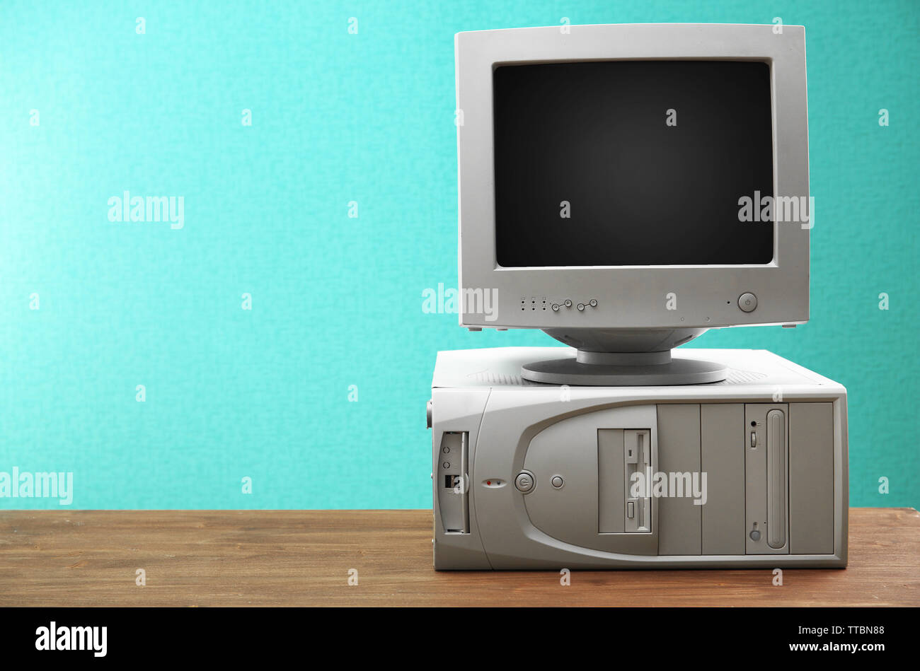 Obsolete computer set on light blue background Stock Photo Alamy