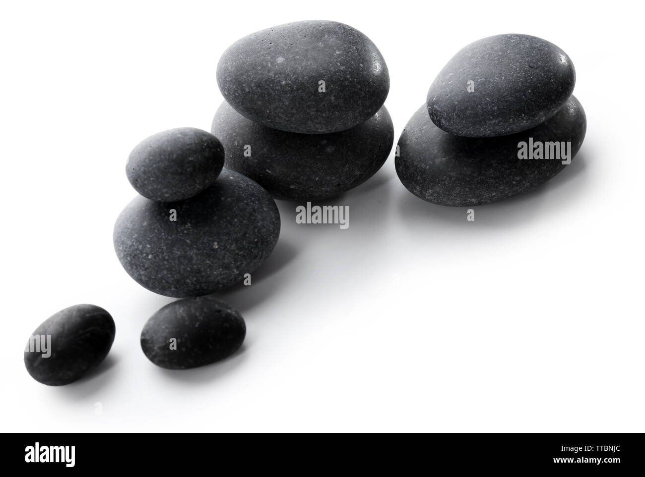 Spa stones isolated on white Stock Photo - Alamy