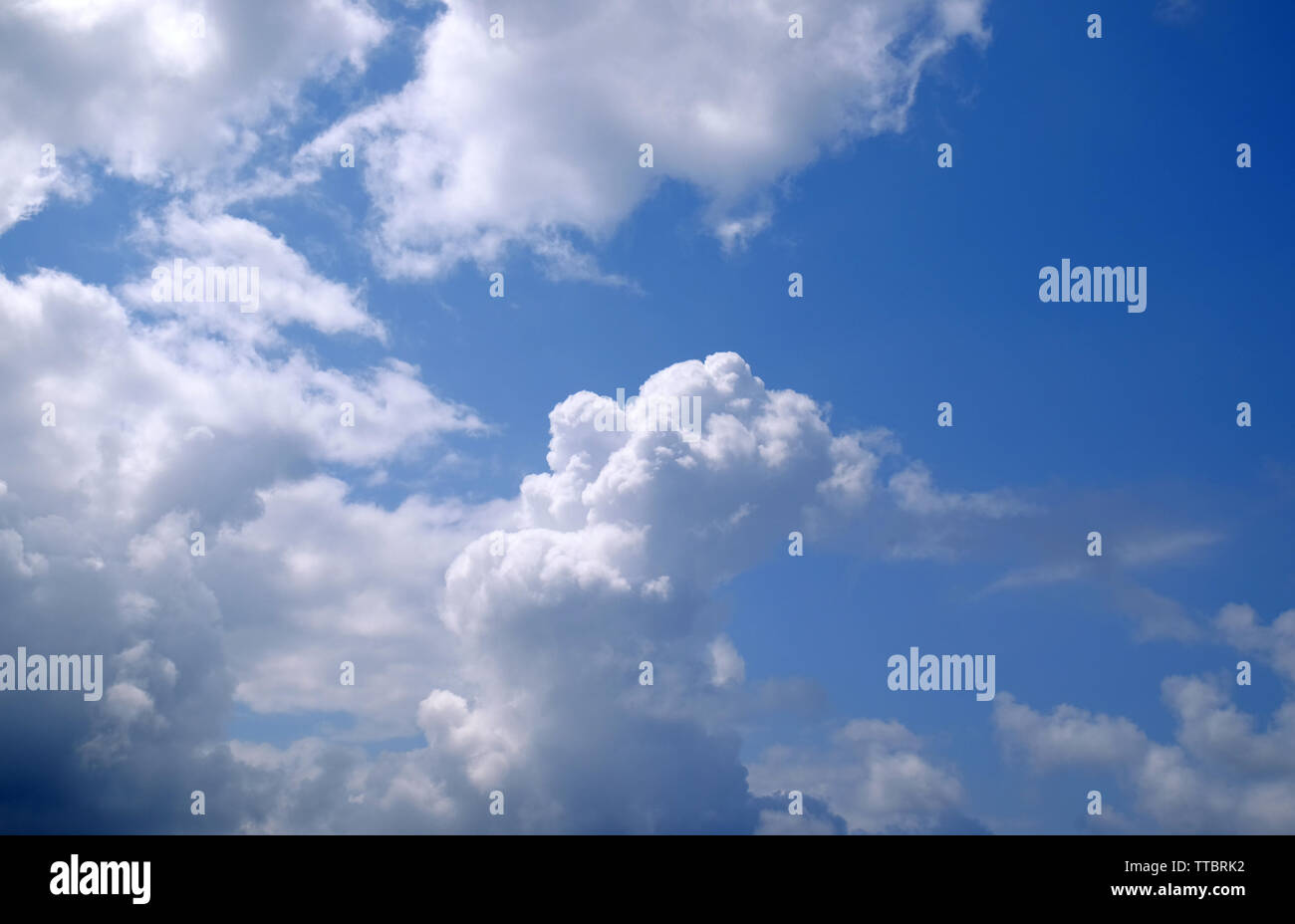 Blue sky background with clouds Stock Photo - Alamy