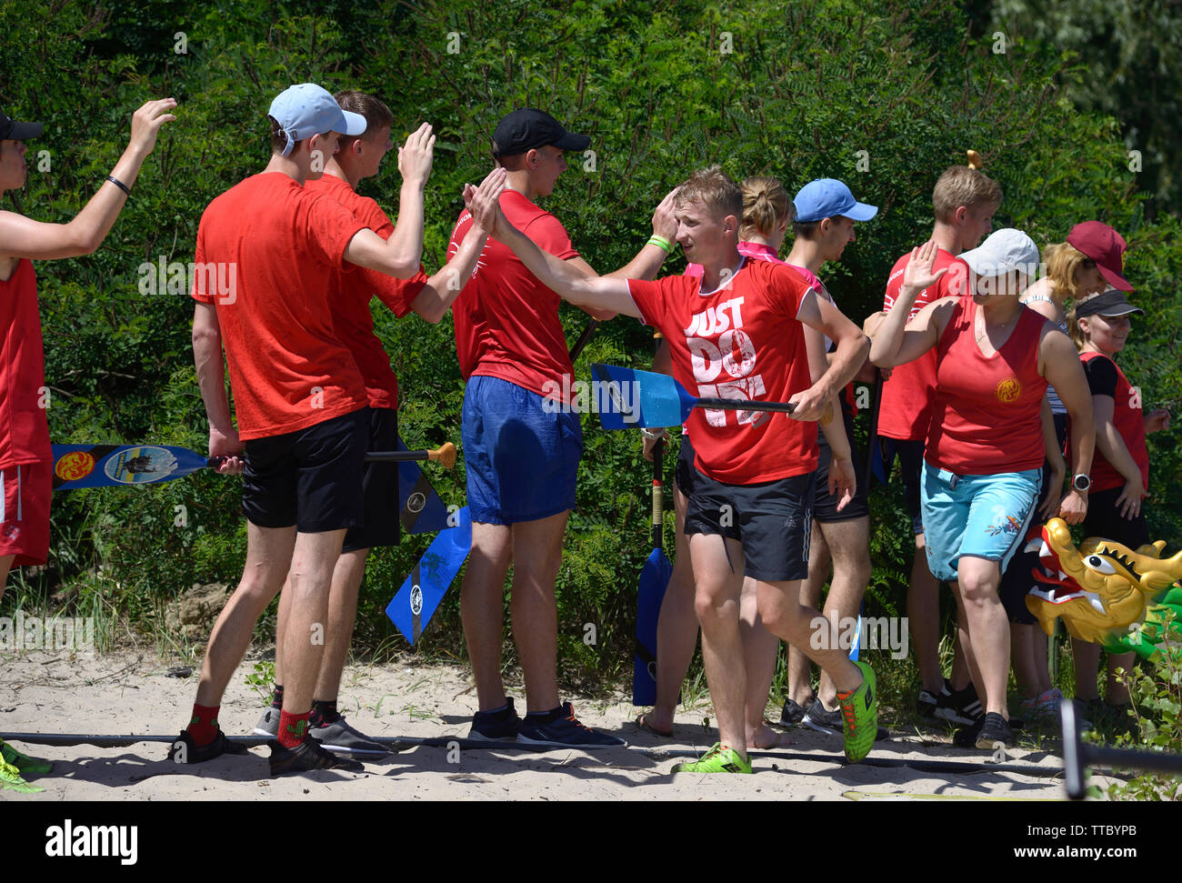 Oarsmen greeting each other. Kiev oblast championship among amateurs. May 25, 2019. Kiev, Ukraine Stock Photo