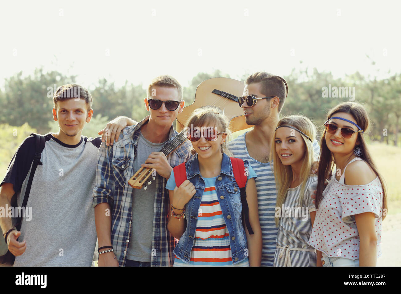 A group of joyful friends having fun outdoors Stock Photo - Alamy