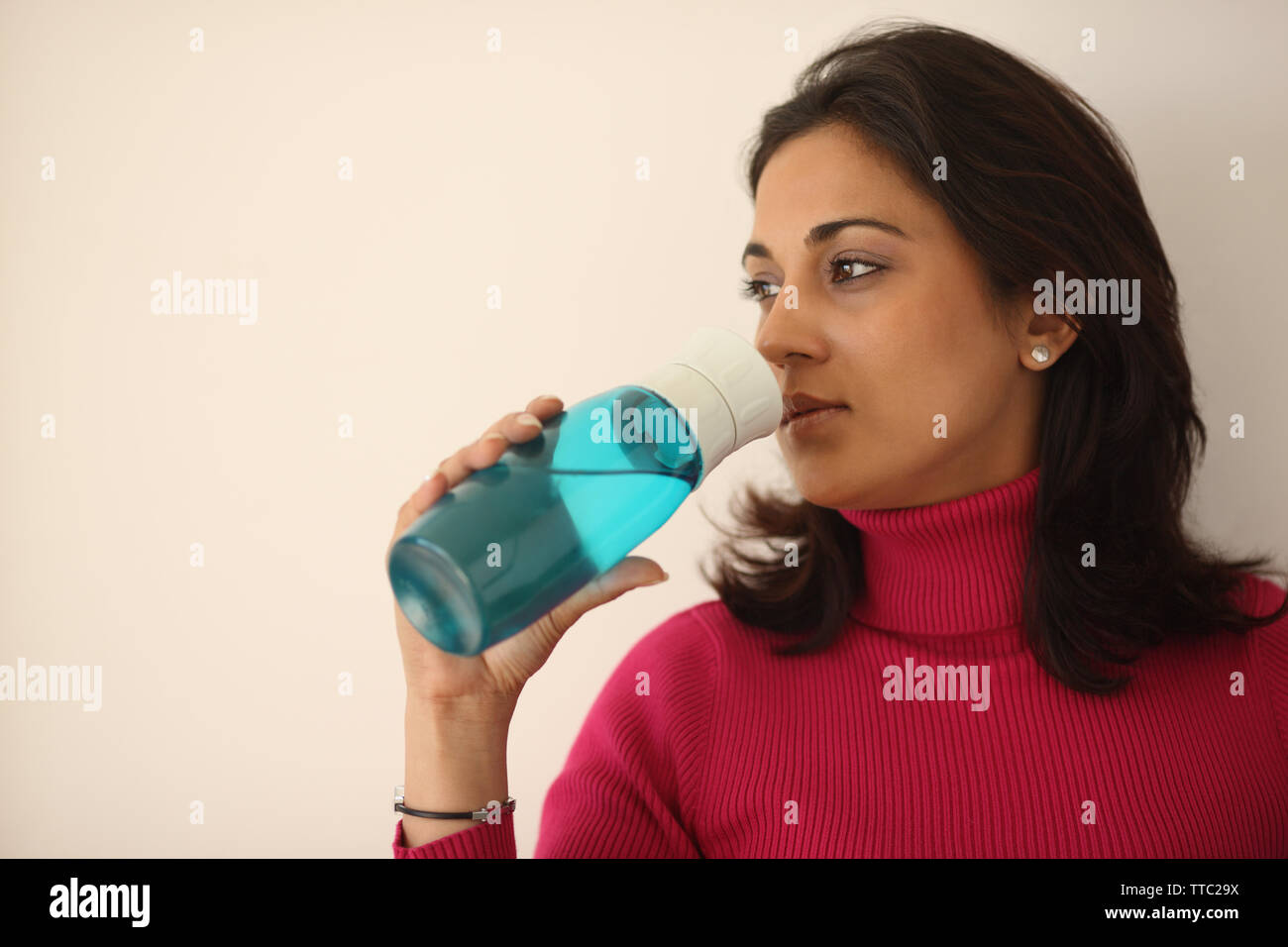 Woman drinking from water bottle Stock Photo by ©photography33 8689824