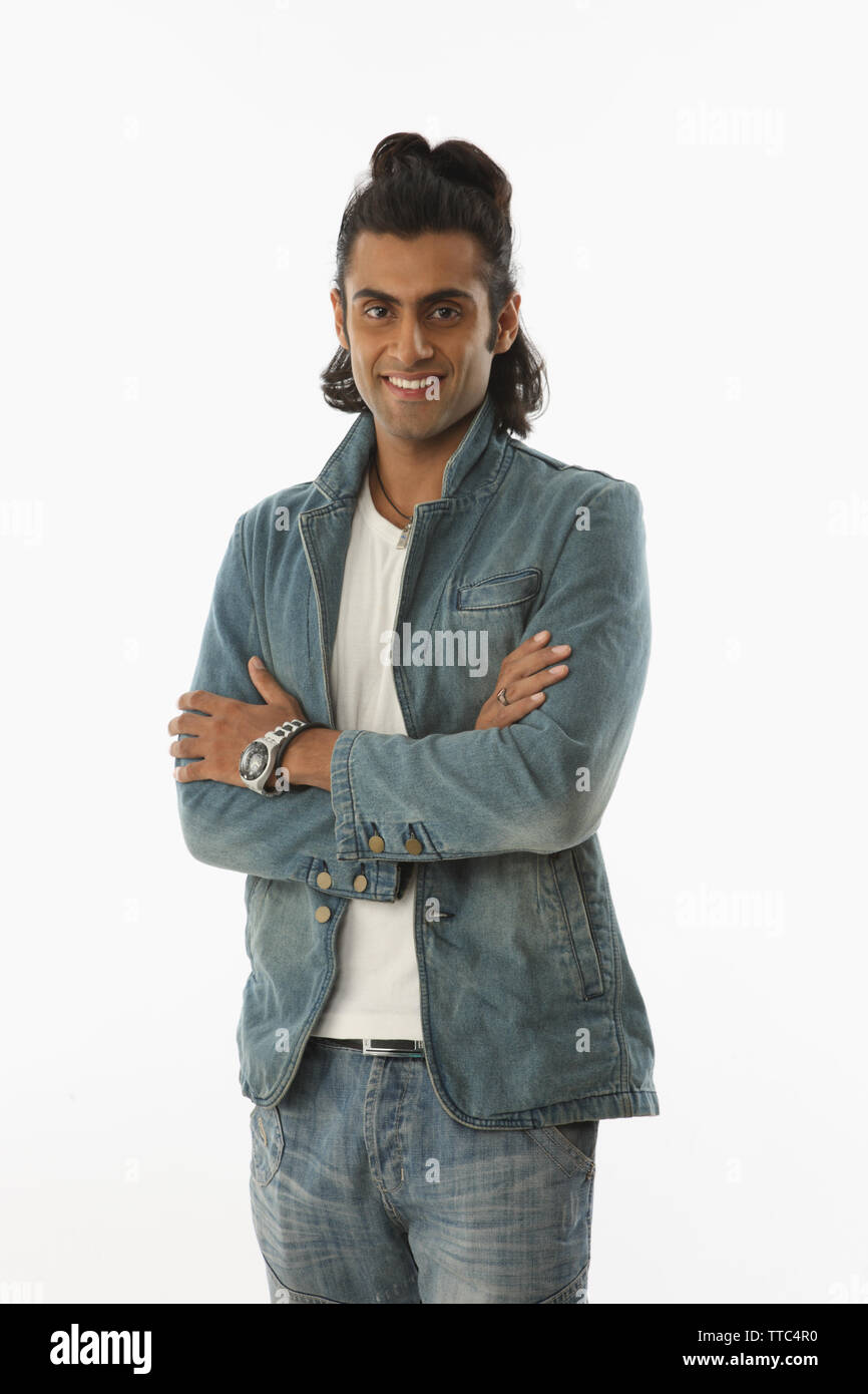 Portrait of a man smiling with arms crossed Stock Photo - Alamy