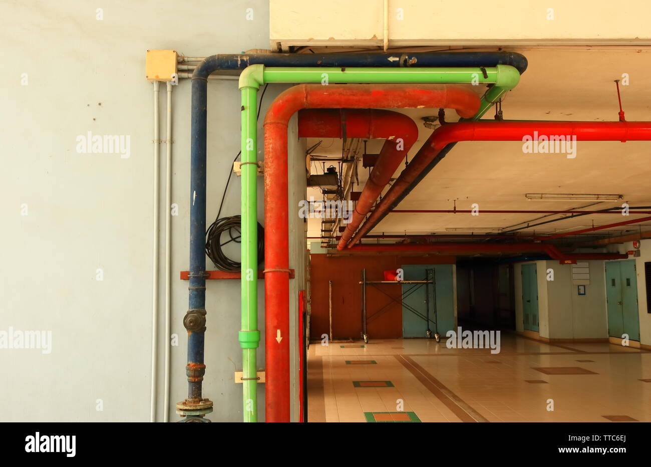 Old vintage metal electricity switch and junction box with exposed conduit  pipes on the surface mounted on a wooden wall alongside a door Stock Photo  - Alamy