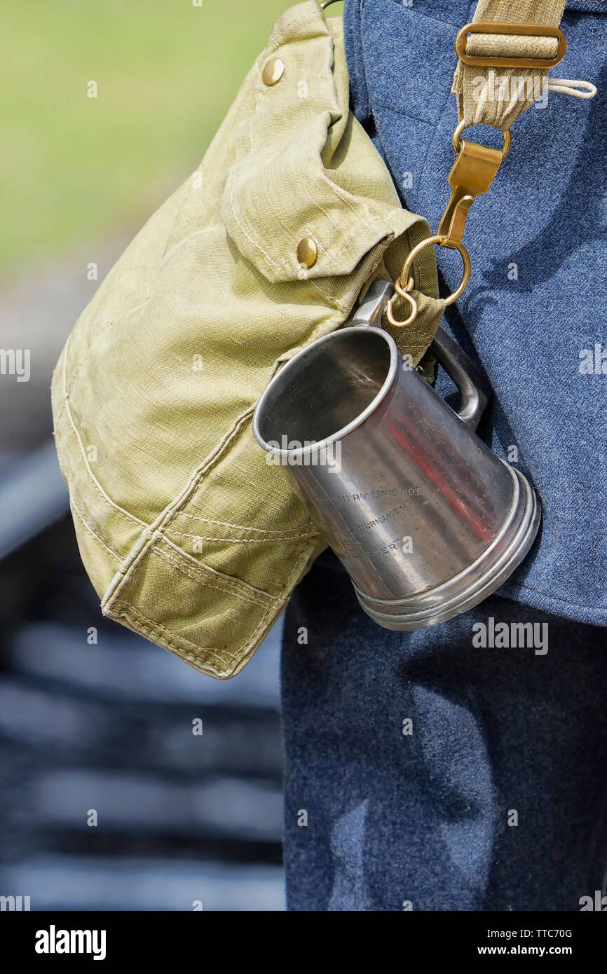 Man in RAF Uniform with Silver Tankard and Gas Mask Case Stock Photo