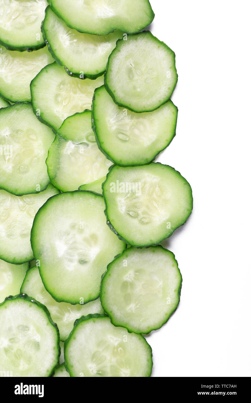 Sliced cucumbers isolated on white Stock Photo