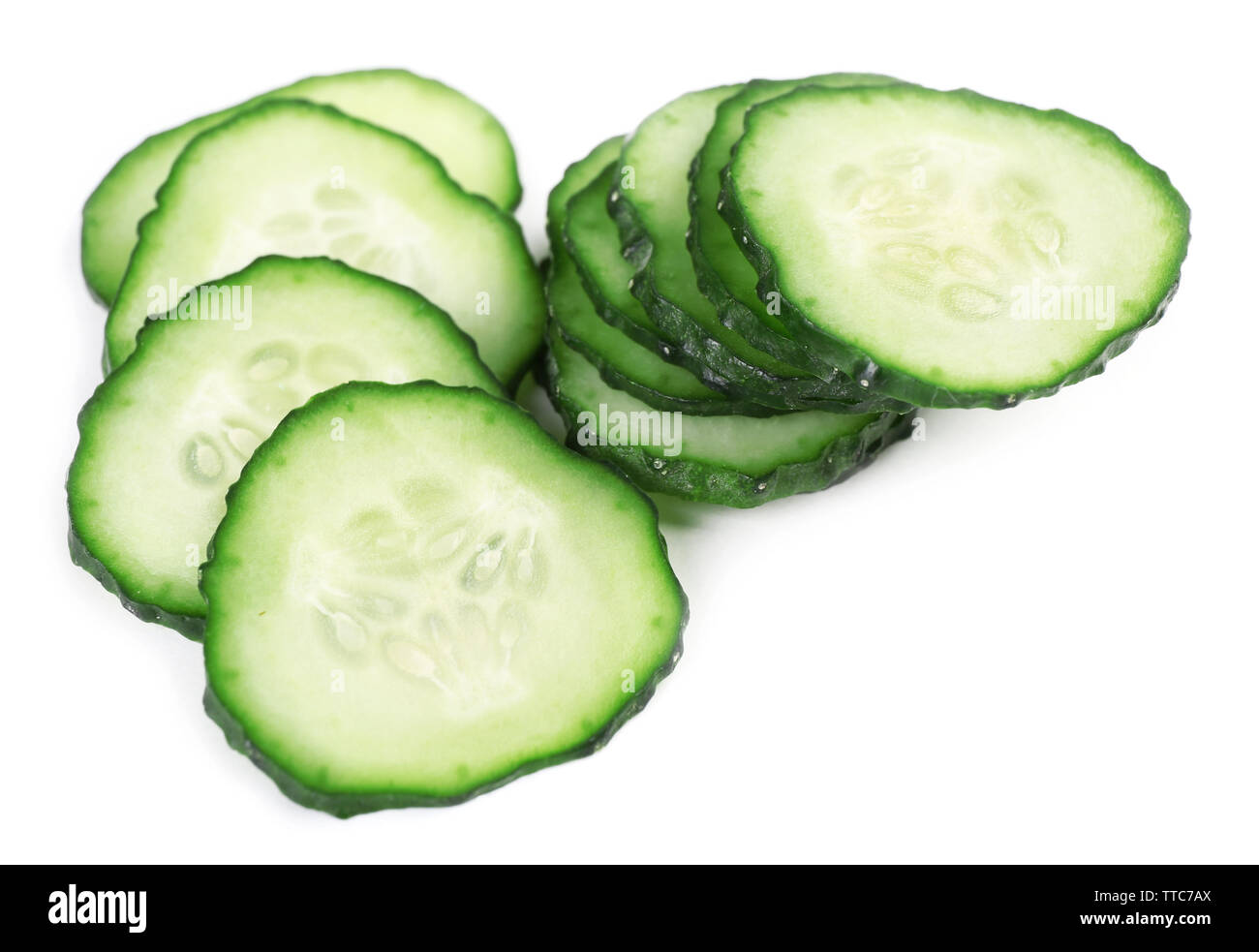 Sliced cucumbers isolated on white Stock Photo