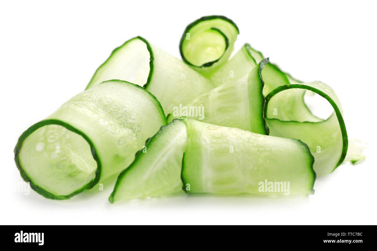 Sliced cucumbers isolated on white Stock Photo