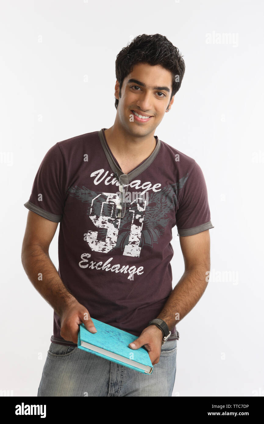 Portrait of a college student smiling Stock Photo - Alamy