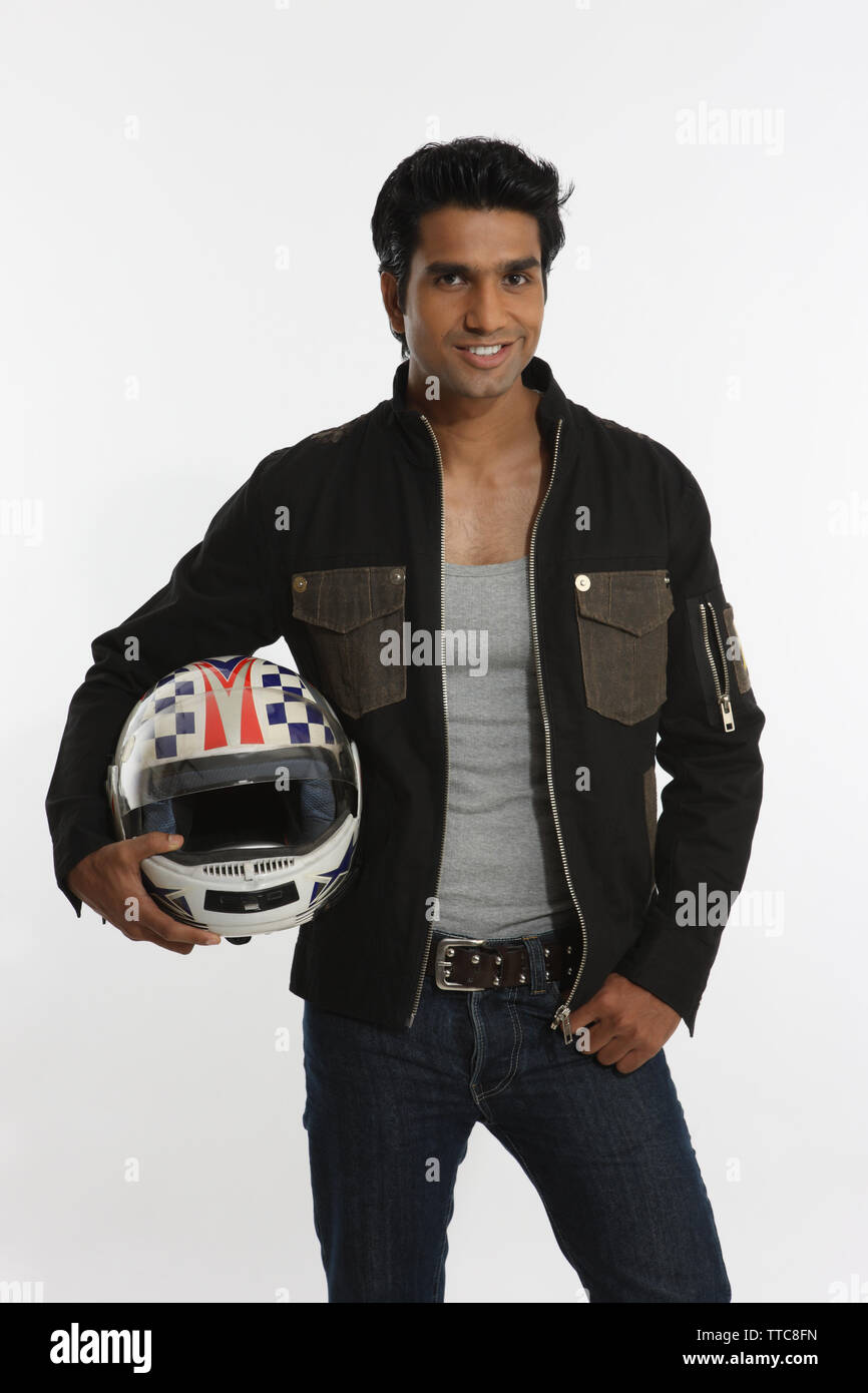 Man carrying crash helmet hi-res stock photography and images - Alamy