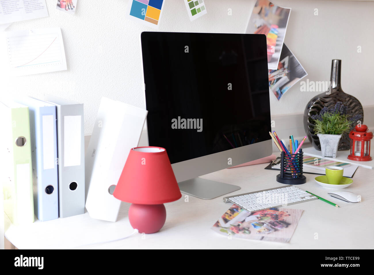 Modern computer on the table in decorated room Stock Photo - Alamy