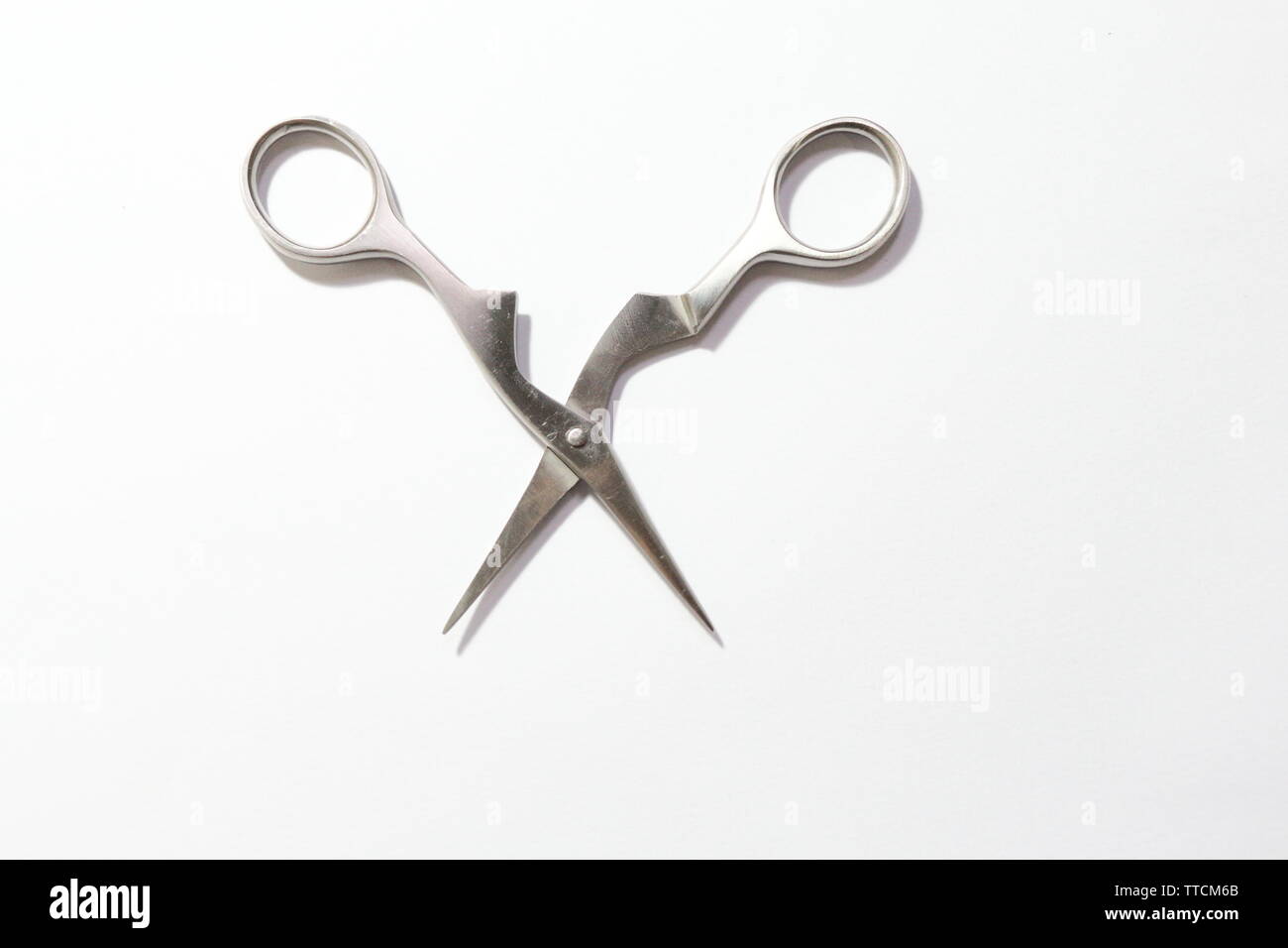 Little scissors to have eyebrow done isolated on white background Stock ...