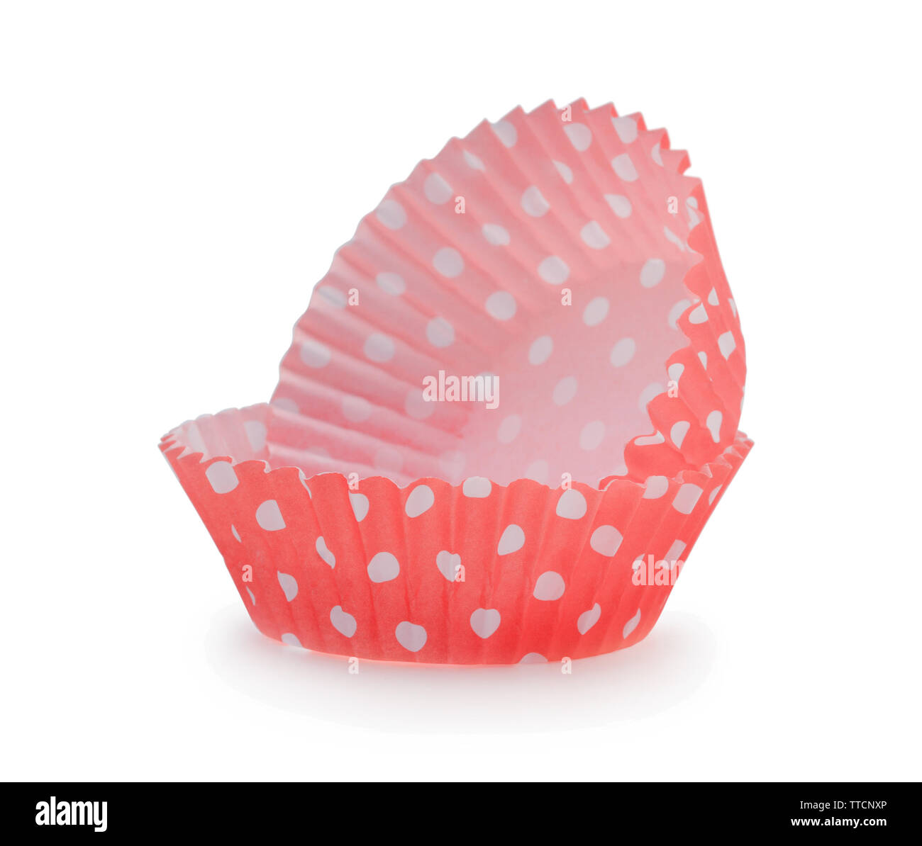 Paper cupcake cups isolated on white background Stock Photo