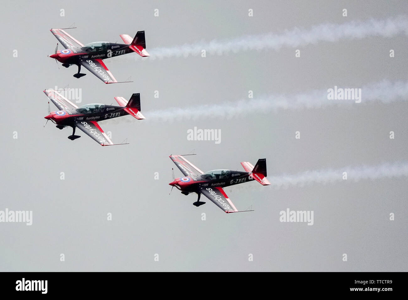 Dunsfold Common Road, Dunsfold. 16th June 2018. The final air show took place at Dunsfold Aerodrome today. Aircraft seen from Dunsfold village as they took part in the aerobatics display. Credit: james jagger/Alamy Live News Stock Photo