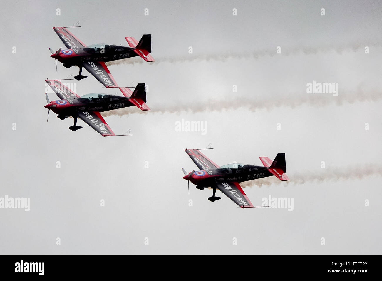 Dunsfold Common Road, Dunsfold. 16th June 2018. The final air show took place at Dunsfold Aerodrome today. Aircraft seen from Dunsfold village as they took part in the aerobatics display. Credit: james jagger/Alamy Live News Stock Photo