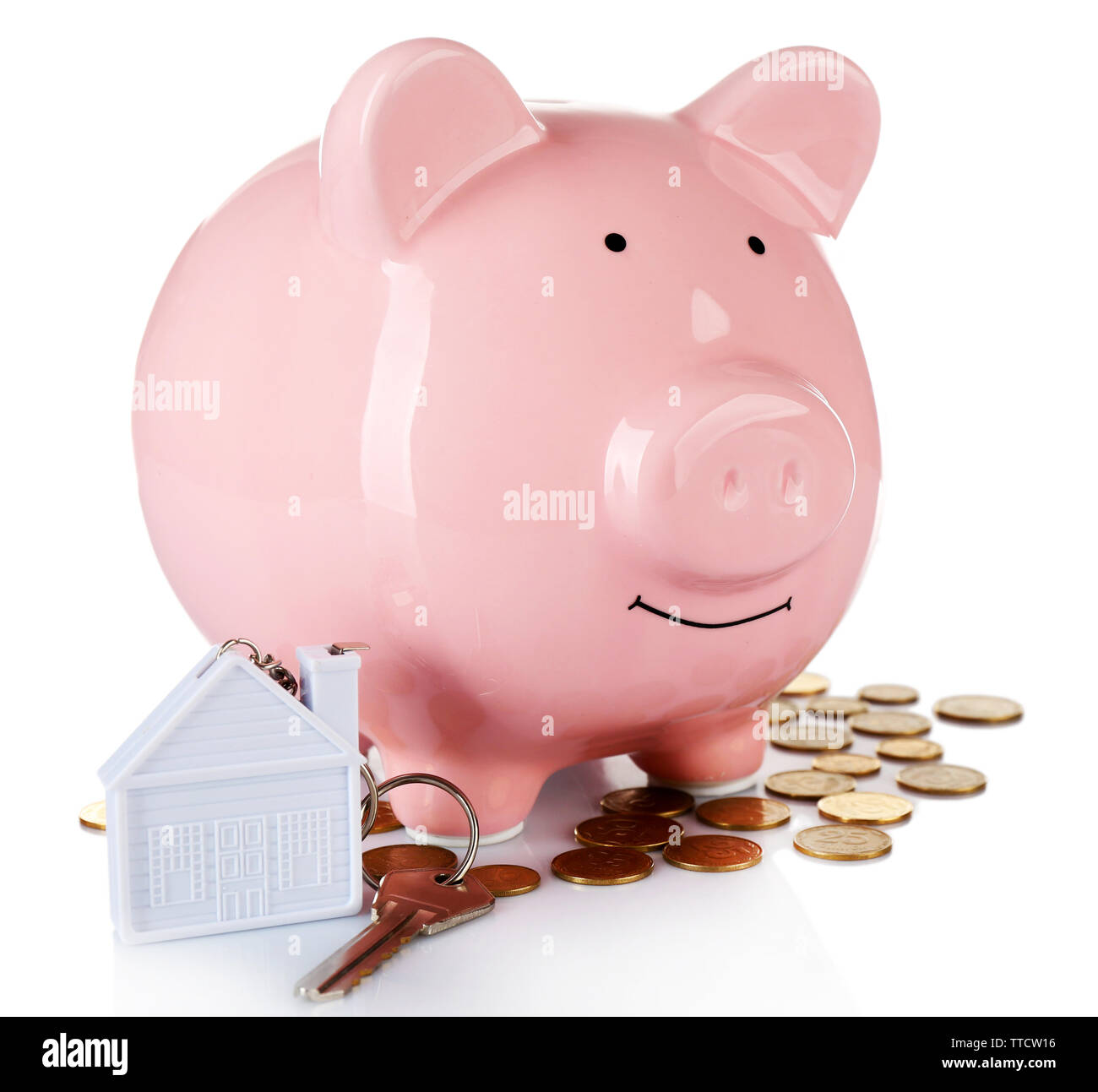 Piggy bank style money box with key isolated on a white Stock Photo - Alamy