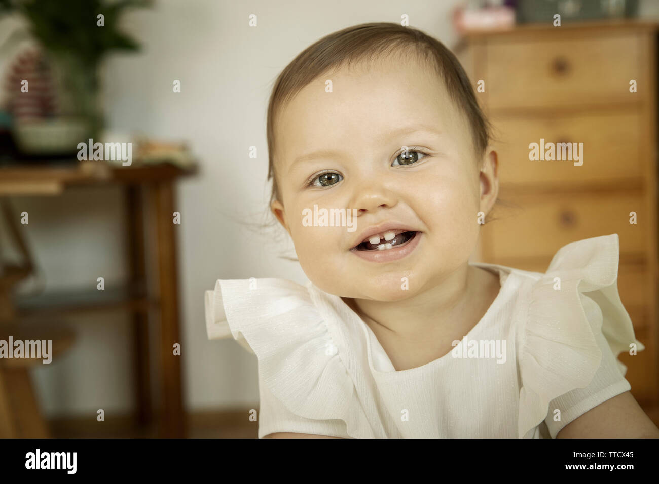 Cute little baby girl smiling Stock Photo