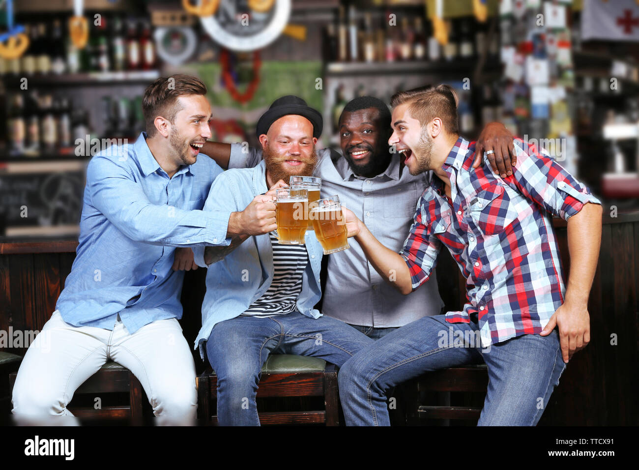 Young people in a bar Stock Photo - Alamy