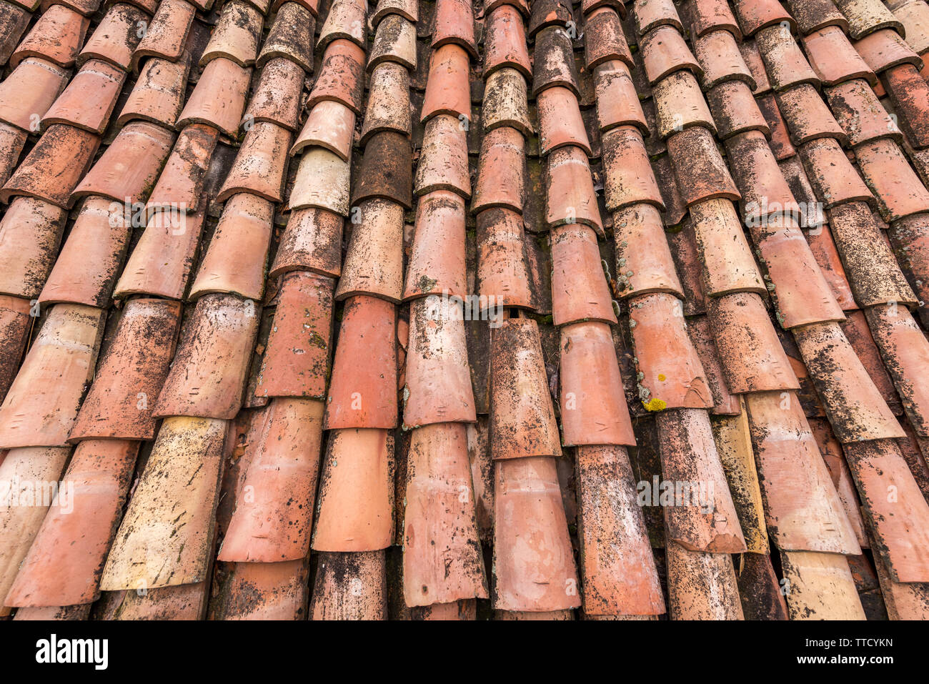 Roof tiles. Roof tiles as you see with your eyes. Some symmetrical, some somewhat disordered, without preserving harmony. A house roof, a building, ev Stock Photo