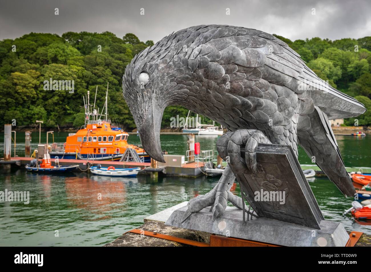 Based on the famous book by famous local author Daphne Du Maurier, Isla the Fowey Bird Sculpture, also known as The Rook with a Book, was created by C Stock Photo