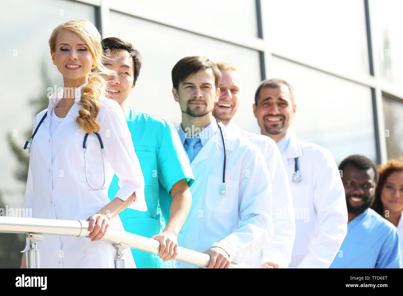 Attractive nurse standing near hi-res stock photography and images - Alamy